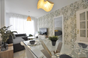 Luminoso y coqueto apartamento con jardín